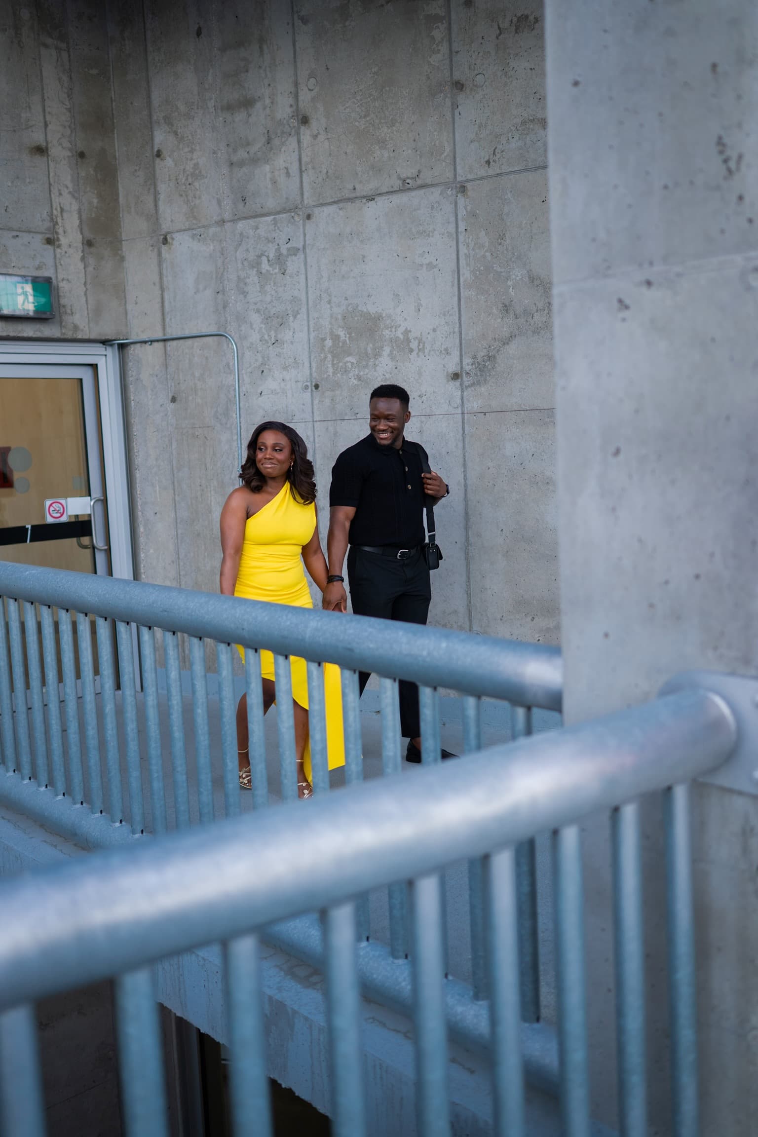 Juwon and Femi walking hand in hand